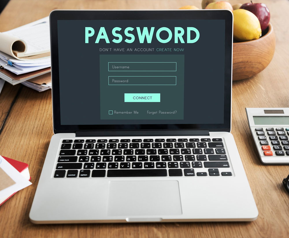 A laptop with a password entry screen