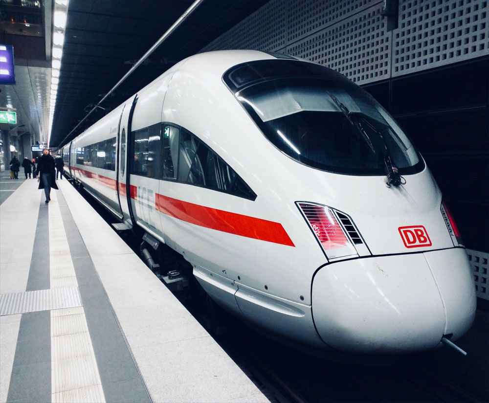 A high-speed train arriving at a station