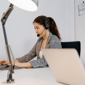 A call center agent reading an interview script